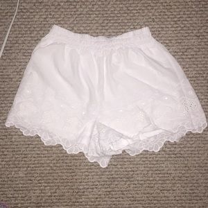 Shorts w/ cute detail at the bottom .